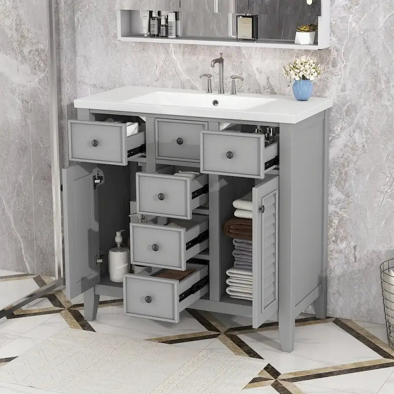Mobile bagno con lavabo in ceramica, due ante e cinque cassetti