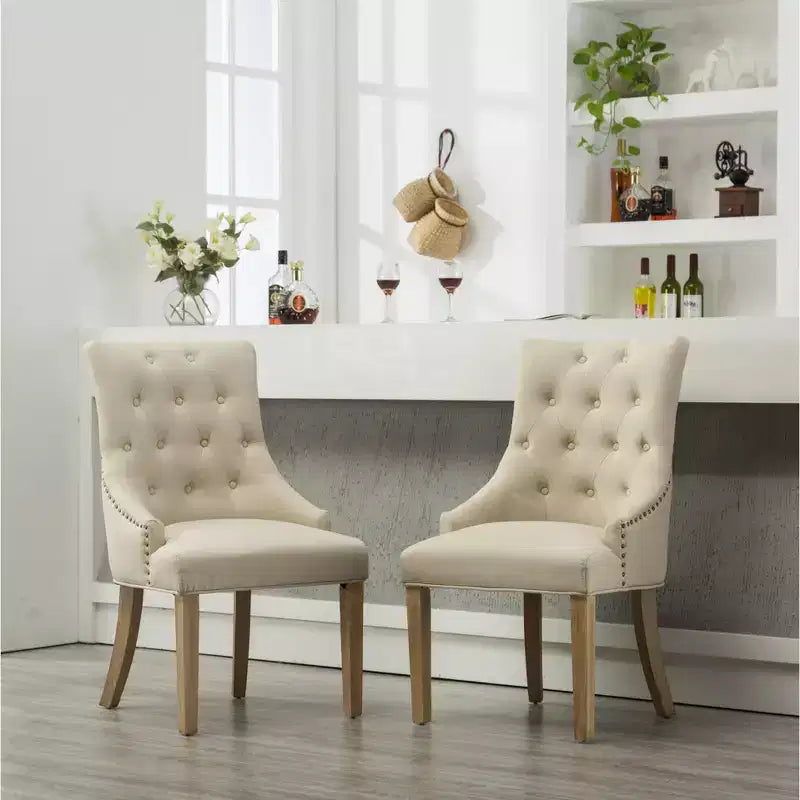 Roundhill Furniture Button Tufted Solid Wood Wingback Hostess Chairs with Nail Heads, Tan, Set of 2